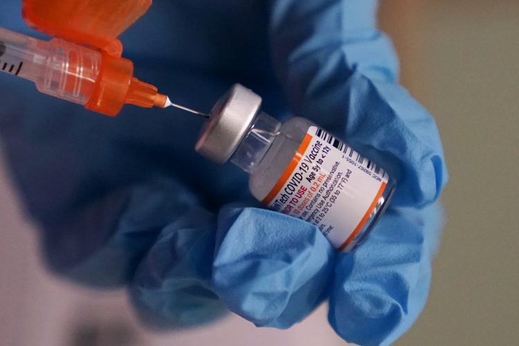 Pfizer begins testing omicron-matched COVID shots in adults